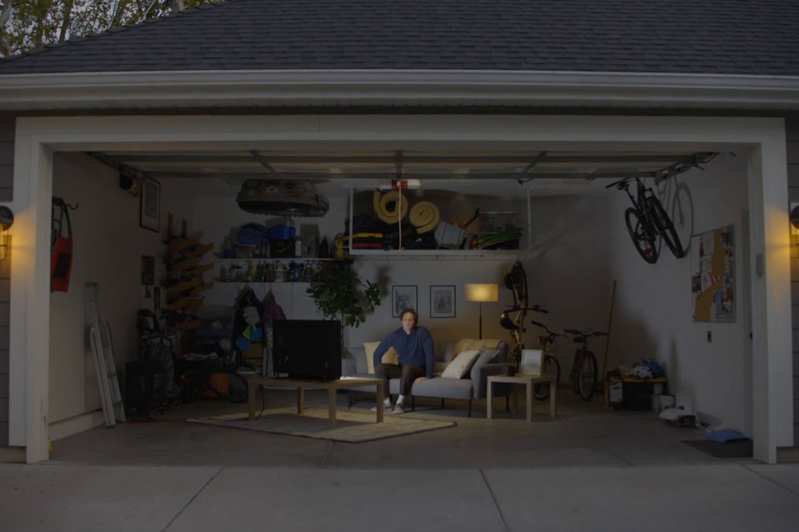 Demand More Supply — a garage door opens on an apartment inside